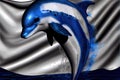 a dolphin with a blue nose and white body is in the water with a silver and blue background and a white and black flag