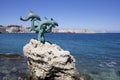 Dolphin statue in Rhodes town, Greece