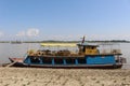 A dolphin watching tourboat on the Irrawaddy. Royalty Free Stock Photo