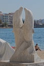 Dolphins statue monument at waterfront promenade in Saranda , Albania Royalty Free Stock Photo