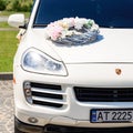 Dolyna, Ukraine June 28, 2021: Porsche car decorated for a wedding, white Porsche.