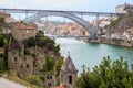 Dom Luis Bridge and Porto Oporto downtown viewed from romantic church ruins