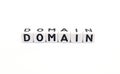 domain name word built with white cubes and black letters on white background Royalty Free Stock Photo