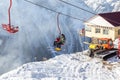 DOMBAI, RUSSIA - JANUARY 3, 2014: People are lifting on open lft high up in Caucasus mountains