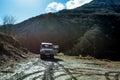 DOMBAY, RUSSIA - FEBRUARY 10, 2018: Offroad car parked in Russian mountains