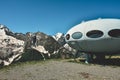 Dombay, Russia - June 11, 2022: hotel is in the form of a flying saucer on the mountain, flying saucer in the mountains, UFO in