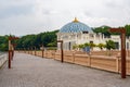 A dome blue tile gold-roofed building