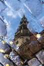The Dome Cathedral in Riga in autumn puddle reflection Royalty Free Stock Photo