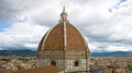 Dome of Cathedral of Santa Maria del Fiore close up against the background of the cloudy sky. Florence, Italy Royalty Free Stock Photo