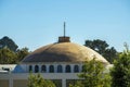 Dome on city rooftop on building or structure in the downtown neighborhood in the city streets or in an urban area of