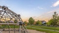 Dome climber on a park near homes in Daybreak Utah