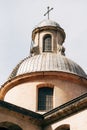 Dome with a cross of the Church of the Nativity of the Virgin in Prcanj Royalty Free Stock Photo