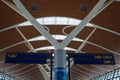 The dome of the international departure area of ??Shanghai Pudong Airport. Boarding gate signage in the terminal building Royalty Free Stock Photo