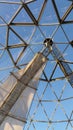 Dome made of triangles on a lookout tower against a blue sky