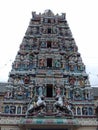 Dome with many colorful sculptures at the main entrance of Sri Maha Mariamman Temple
