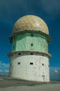 Dome of old radar station on rocky landscape Royalty Free Stock Photo