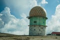 Dome of old radar station on rocky landscape Royalty Free Stock Photo
