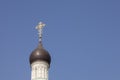 Dome of the Orthodox Church with a golden cross against the blue sky Royalty Free Stock Photo