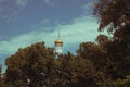 The dome of the Orthodox church over the trees. Golden dome against the blue sky. Autumn landscape Royalty Free Stock Photo