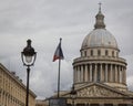 Dome of the Pantheon historical monument in Paris, France captured against the grey cloudy sky Royalty Free Stock Photo