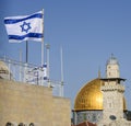 The dome of the rock and a mosque with an israeli flag, jerusalem, israel