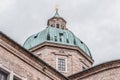 Dome of Salzburg Cathedral during overcast cloudy rainy day in Austria in winter Royalty Free Stock Photo