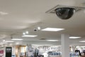 Dome security camera on top of ceiling Royalty Free Stock Photo