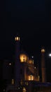 a dome shaped masjid or mosque with ambient lighting