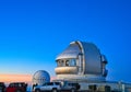 The dome-shaped observatory on top of the mountain at sunset. Royalty Free Stock Photo