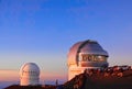 The dome-shaped observatory on top of the mountain at sunset. Royalty Free Stock Photo