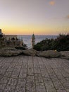 The dome of the temple against the background of the calm sea, surrounded by the walls of the old city. Royalty Free Stock Photo