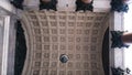 Domed ceiling lined with tiles. Concept. Bottom view of Cathedral`s beautiful antique ceiling with columns and patterned