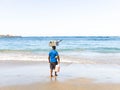 Domenican Republic beach with a man with a container with snacks and drinks Royalty Free Stock Photo