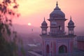 A picture of the dome and a clock tower in a Mosque at sunset or sunrise, the tallest clock tower Royalty Free Stock Photo