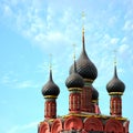 The domes of the church of the archangel michael against the blue sky with clouds. Yaroslavl, Russia