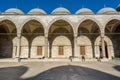 Domes and interiors of Suleymaniye Mosque against blue sky in Istanbul, Turkey