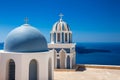 Domes on the rooftop of the Church of St. Mark the Evangelist and the Aegean Sea on the Fira City at Santorini Island