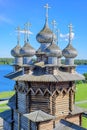Domes of the wooden orthodox Church Of The Protection Of The Holy Virgin.