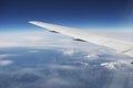 Domestic Airline Wing In Flight Over Mountains From Window Royalty Free Stock Photo