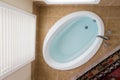 Domestic bathtub full of clean water Royalty Free Stock Photo