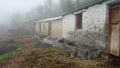 Domestic cattle house and feed troughs for cattle in rural India of the himalayan region. Uttarakhand India