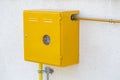 Domestic gas meter on wall outside Royalty Free Stock Photo