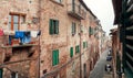 Domestic life of italians, houses with balconies and narrow streets of cities