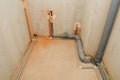 Domestic plumbing and sewage pipes connections in house construction.