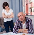 Domestic quarrel between offended husband and his wife at home
