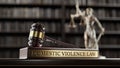 Domestic violence law: Judge's Gavel as a symbol of legal system, Themis is the goddess of justice and wooden stand Royalty Free Stock Photo