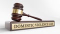 Domestic violence law: Judge's Gavel as a symbol of legal system and wooden stand with text word Royalty Free Stock Photo