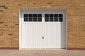 Domestic white side hinged garage doors. Hertfordshire. UK
