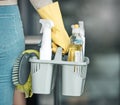 Domestic worker, maid or cleaner hands holding or carrying cleaning products and equipment or supplies. For home hygiene Royalty Free Stock Photo