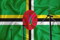 Dominica flag alternative energy wind illustration silhouette wind generator on the background of the flag. Renewable energy